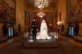 It looks very different from her first wedding gown. Meghan Markle S Wedding Dress On Display Inside The Duke And Duchess Of Sussex S Wedding Outfits Exhibition