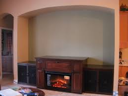 What is the best electric fireplace media center? Custom Made Maple Entertainment Center With Electric Fireplace By Baltic Woodsmith Custommade Com