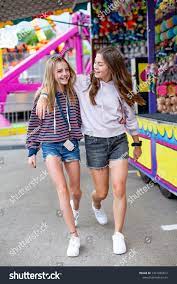 Candid Photo Two Cute Smiling Teenage Stock Photo 1421985812 | Shutterstock