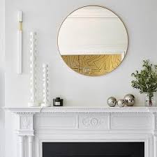 Enhance your decor with this graceful mirror. Infinity Thin Brass Frame Arched Mantel Mirror