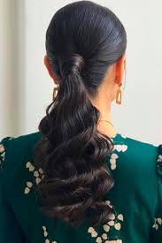 The heavy fringes on the forehead complete the entire look. 35 Unique Low Ponytail Ideas For Simple But Attractive Looks