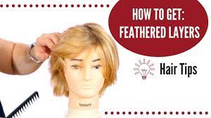 Take a pair of feathering shears in your other hand and snip at the ends of your hair. How To Get Feathered Hair Thesalonguy Youtube