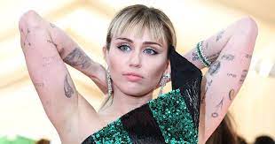 Browse 298 miley cyrus tattoos stock photos and images available, or start a new search to explore more stock photos and images. Miley Cyrus Tattoos Guide To All Her Ink And Their Meanings