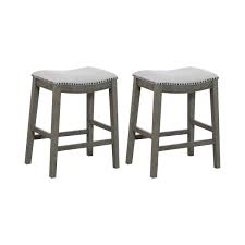 The urban port mango wood saddle seat bar stool in brown/black. Saddle Seat Upholstered Bar Stools Counter Stools You Ll Love In 2021 Wayfair