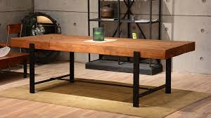 The industrial look of the black iron frame is complemented by the rustic top of the side tables, creating an exciting mix of styles. Industrial Dining Room Industrial Dining Room San Francisco Houzz