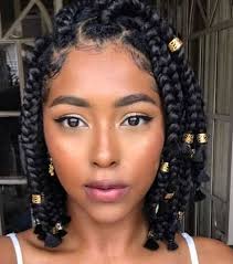 Meanwhile, the clear crystal beads and silver rings add a bohemian flair to this otherwise stately hairdo. 130 Braids With Beads Ideas In 2021 Braids With Beads Natural Hair Styles Braided Hairstyles
