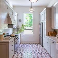 These eight rooms look fantastic with black and white floors. Red And Black Mosaic Kitchen Floor Tiles Design Ideas