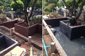 Gunite is a spray concrete commonly used to line swimming pools. Timber Decking And Modern Fish Pond Bangkok Thai Garden Design