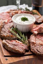 Prime rib roast is a classic holiday dinner that is easier to make than you think with just 4 ingredients. Garlic Rosemary Prime Rib Roast With Horseradish Cream Christmas Food Dinner Rib Recipes Prime Rib Recipe