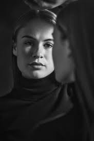 Intense Gaze of a Woman in Black and White