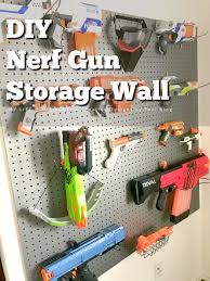 My son and his friends love having nerf battles in the neighborhood park, and we've collected quite the armory over the years! Diy Nerf Gun Storage Wall My Life Homemade