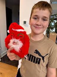 Someone just got a BONUS gift! We ran out to Walmart and noticed the  holiday Fuggler was reduced! He was super pumped when we got home with it!!  If you were wanting