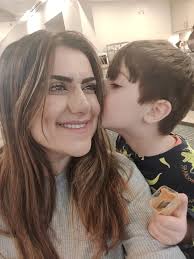 Can you edit a photo to make my son look happier?