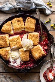 Skillet Strawberry Bourbon Cobbler With Layered Cream Cheese Biscuits Half Baked Harvest Recipe In 2020 Half Baked Harvest Recipes Strawberry Recipes Cobbler Recipes