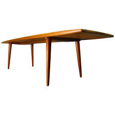 Danish modern jellybean desk in teak $ 3,600; Danish Modern Long Teak Surfboard Coffee Table Stamped Kt 20 Denmark At 1stdibs