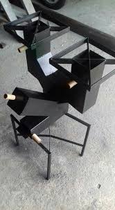 Building A Sen Wait That S A Table Rocket Stove Design Rocket Stoves Outdoor Stove