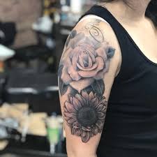 Black roses symbolize death, rebirth, and goodbye. 250 Amazing Sunflower Tattoo Designs With Meanings And Ideas Body Art Guru