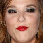 K. Michelle: Red Zipper Boots, Ripped Jeans