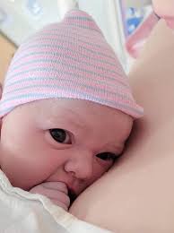 Grandmother babysitting her granddoll Twila