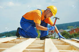 Check spelling or type a new query. Construction Roofer Carpenter Worker Nailing Wood Board With Hammer On Roof Installation Work Stock Photo Picture And Royalty Free Image Image 21945782