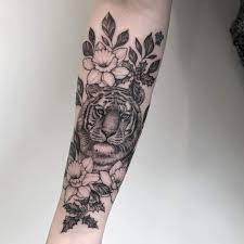 12 Best Tiger And Flower Tattoo Designs Tattoos For Women Flowers Flower Tattoo Designs Tiger Tattoo Design