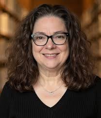 What are some alternative lighting options for an entry hall with track  lighting?