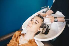 Courtesy of rita hazan, drybar, john barrett salon, shampoo avenue b with a client list that includes uma thurman, joan jett,. Beauty Hair Care And People Concept Happy Young Woman With Hairdresser Washing Head At Hair Salon Stock Photo Image Of Hair Hairstyle 146218402