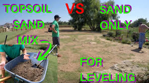 To apply topsoil using this simple method you first put bundles of soil evenly over your lawn that look like little molehills. Leveling With Sand Vs Topsoil Mix Youtube