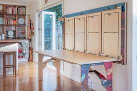 The World S Thinnest Folding Table And Chair System Can Be Stored On The Wall Living In A Shoebox Space Saving Table Table And Chairs Foldable Furniture