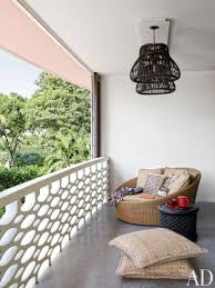 Ideas for a balcony design to fit in both a home workspace and laundry. 14 Cozy Balcony Ideas And Decor Inspiration Architectural Digest
