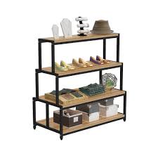 We did not want the stainless steel fridge to be a monolith of steel, so we designed tall filler pull out storage left and right of fridge and took the panels to the ceiling. Creative Pastry Cabinet Island Cabinet Side Cabinet Promotional Taiwan Snacks Convenience Store Shelf Display Rack Maternal Stores Island Shelf