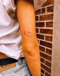 I want my tattoos to bring back these memories, because mine isn't so great as it is. Minimalist One Line Elephant Tattoo On The Tricep
