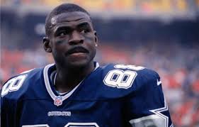 Michael Irvin was a wide receiver for the Dallas Cowboys from 1988 to 1999.  He won three Super Bowls (XXVII, XXVIII, and XXX) and was a key part of the  Cowboys' dominant