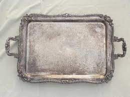 The tray's maker will influence the price, as will the design. Antique Silver Over Copper Tray Huge Vintage Estate Silver Plate Serving Tray