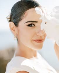 Ana, the radiant bride, shared an incredibly special bond with her  grandfather. His eyes glistened with tears of joy, and he never left her  side, cherishing every precious moment of the wedding.