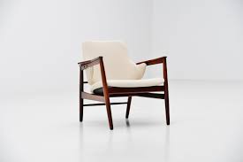 Stunning pair of mid century modern danish lounge chairs. Ib Kofod Larsen Lounge Chair Christensen Larsen Denmark 1953 Massmoderndesign