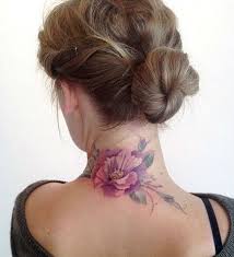 Bird tattoos mean freedom, nobility, motherhood, family and beauty; Purple Flower Tattoo On Girl Back Neck