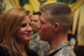 Michelle Peterson embraces her fiance, Sgt. Chris Baldwin,