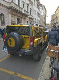 Spotted some time ago, Max Felicitas' gold wrapped [Hummer H3], in  Montenapoleone Street, Milan : rspotted