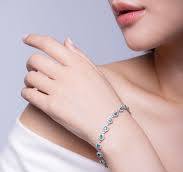PARAIBA TOURMALINE AND DIAMOND BRACELET