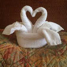 To fold a towel swan, follow these directions. Love Swan Towels Towel Animals Fancy Towels Washcloth Crafts