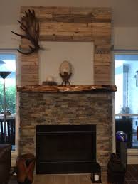 Redid My Boring Builder Grade Fireplace Using Recycled Pallet Wood A Custom Finished Mesquite Log Mantle And Wood Burning Fireplace Fireplace Recycled Pallet