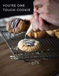 Drizzle chocolate over the edges and tops of cookies or dessert. White Chocolate Drizzle Jam Peanut Butter Cookies Blogtastic Food