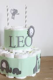 Stadt Oder Landeltern Diy Windeltorte Mit Lowen Giraffen Elefanten Und Affen Windeltorte Selber Machen Geburtsgeschenk Windeltorte Basteln Junge