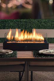 Propane fire pit table on wood deck. The 9 Best Outdoor Fire Pits For Your Backyard Or Patio 2021
