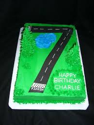 7 Year Old Boy Birthday Cake Ideas Race Car Track Cake Year Old Son He Wanted A Race Car Cake We Put Some Of His Cars Race Track Cake 7th Birthday Cakes Race Car Cakes