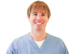 Dental personnel dress in bright coordinating colors. Our Pediatric Dentists Drs Bret Sorensen Ryan Wing The Kid Dentist