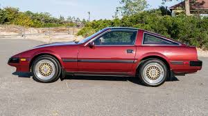 Image result for Maroon 1959 Datsun