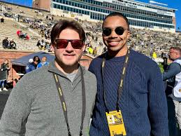 Adam Ryerson, left, and Wendell Shepherd, MU football beat writers for the  @comissourian, visit the sidelines at Faurot Field Saturday before the  start of Mizzou's home game against LSU. Their reaction to