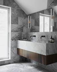 A mix of ann sacks surfaces, including a pebble wall covering, brings a warm feel to a guest bath of an aspen, colorado, home which was renovated by stonefox architects. Artilleriet Bathroom Design By Artilleriet Studio From Facebook